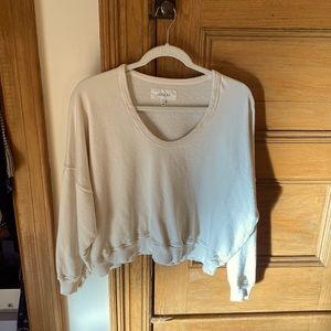 White sweatshirt by The Great.